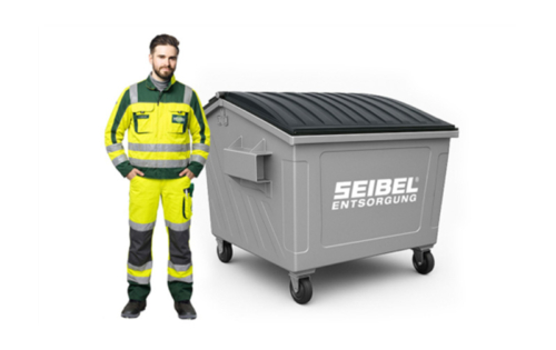 Seibel Mitarbeiter in Arbeitskleidung neben einem grauen Umleerbehälter